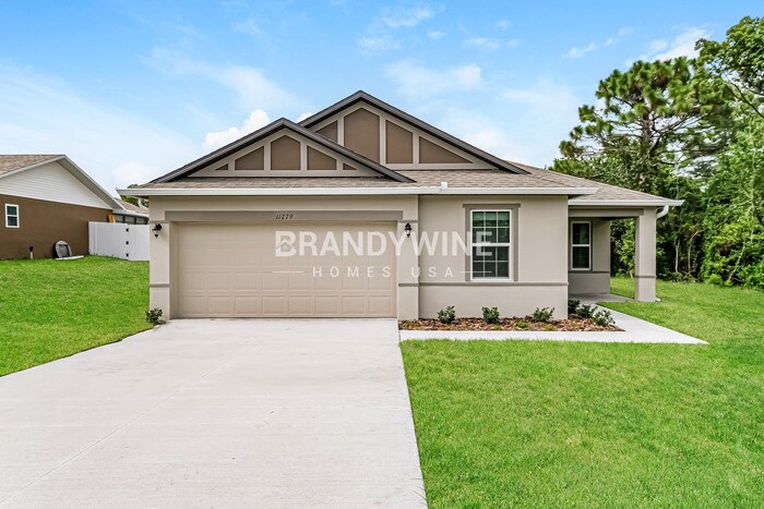 11279 Redgate St in Spring Hill, FL - Building Photo