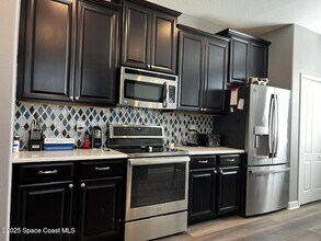 6148 Van Ness Dr in Melbourne, FL - Foto de edificio - Building Photo