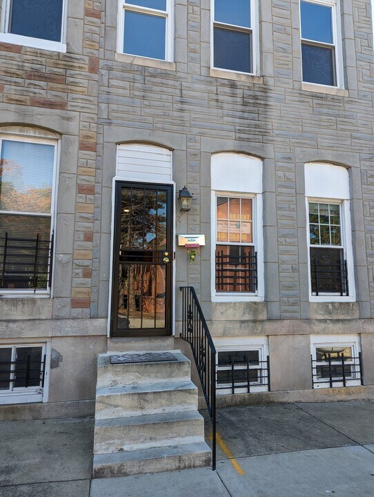 1209 E Oliver St in Baltimore, MD - Foto de edificio