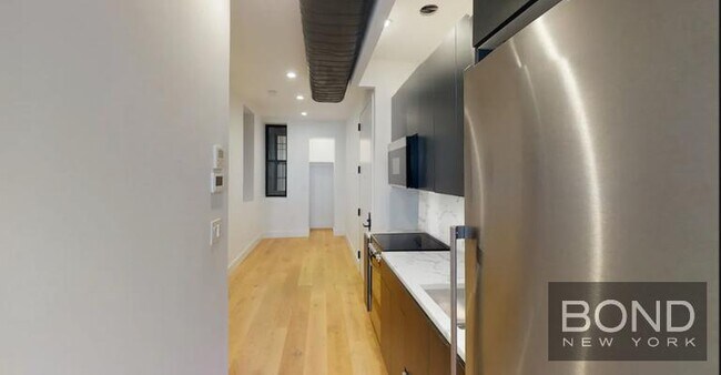 property at 77 E 3rd St