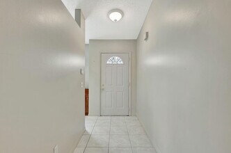 5489 NW Evanston Ave in Port St. Lucie, FL - Building Photo - Building Photo