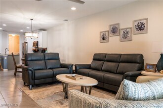 14888 Edgewater Cir in Naples, FL - Building Photo - Building Photo