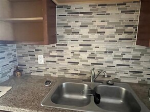 7305 W Atlantic Blvd, Unit 105 in Margate, FL - Building Photo - Building Photo