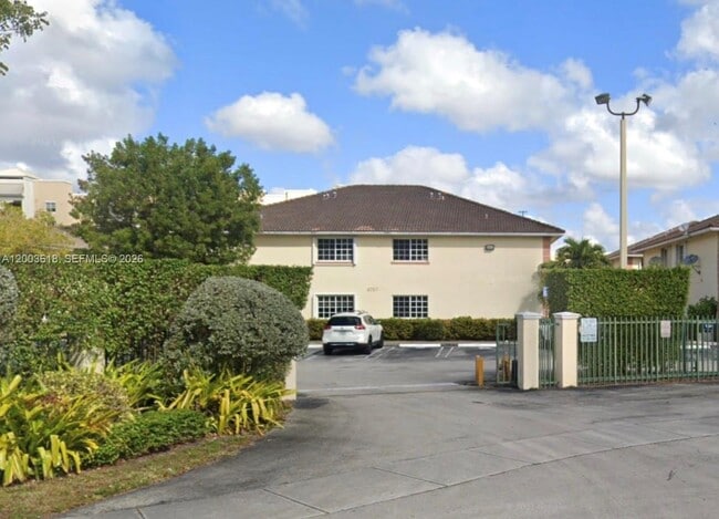 property at 6763 NW 182nd St