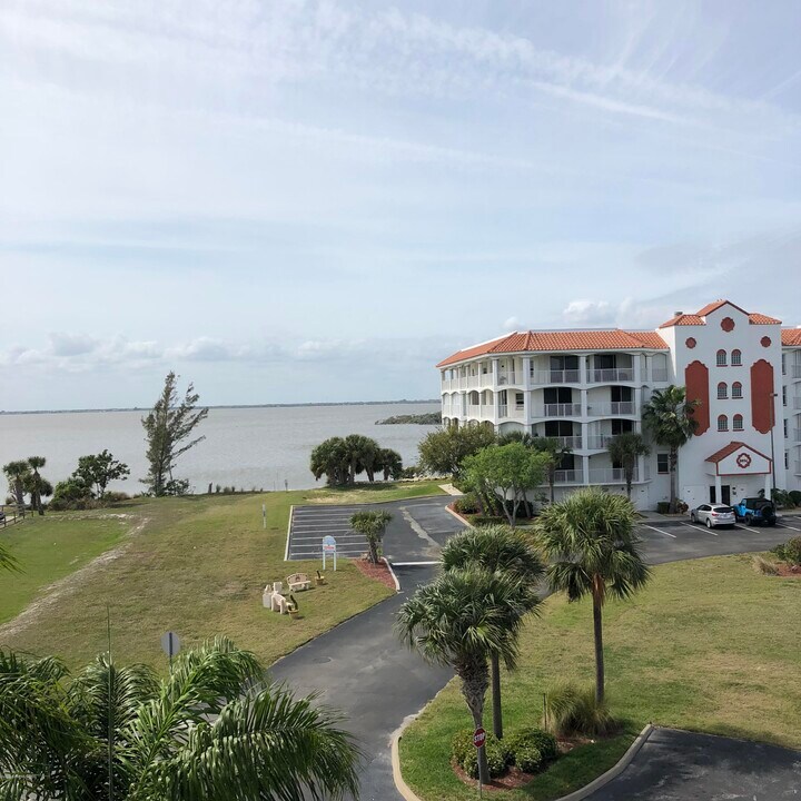8935 Puerto Del Rio Dr in Cape Canaveral, FL - Building Photo