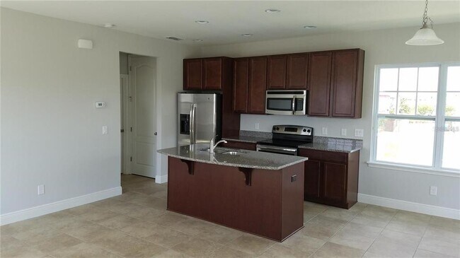 8091 Laureate Blvd, Unit B in Orlando, FL - Building Photo - Building Photo
