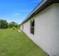 206 Pembroke St in Lehigh Acres, FL - Building Photo - Building Photo