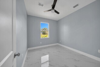 104 Harry Ave S in Lehigh Acres, FL - Building Photo - Building Photo