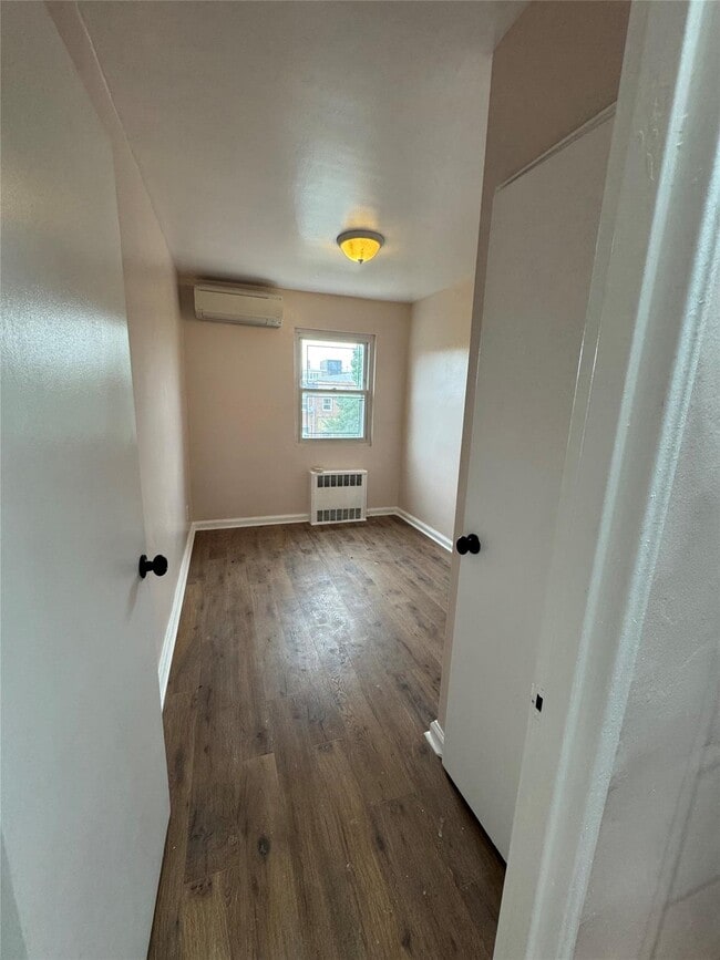property at 153-32-153-77 77th Ave