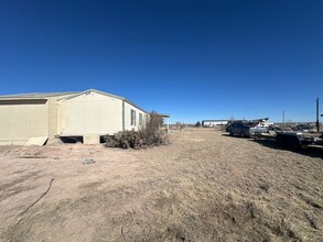 64 Viajero Ave in Moriarty, NM - Building Photo - Building Photo