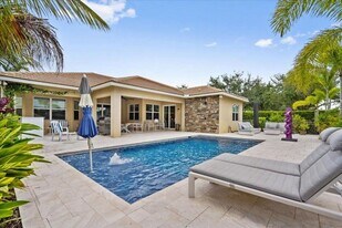 8152 Butler Greenwood Dr in Royal Palm Beach, FL - Building Photo