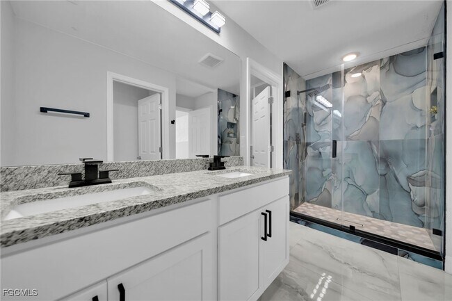 3095 NW 4th Pl in Cape Coral, FL - Building Photo - Building Photo