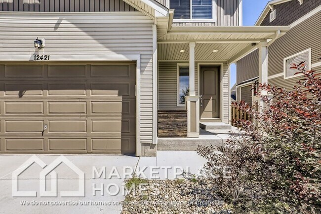 12421 E 105th Pl in Commerce City, CO - Building Photo - Building Photo