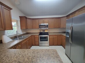 5795 SE Mitzi Ln in Stuart, FL - Building Photo - Building Photo