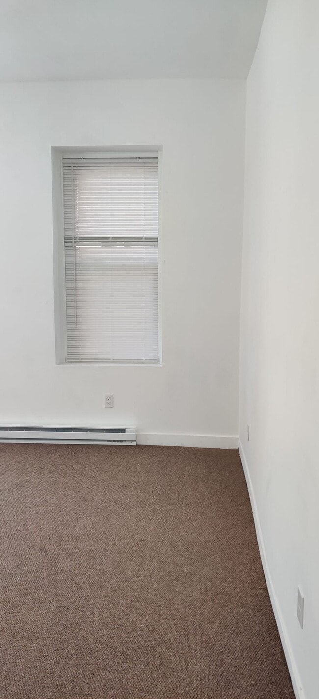 2321 Eutaw Pl, Unit 1B in Baltimore, MD - Building Photo - Building Photo