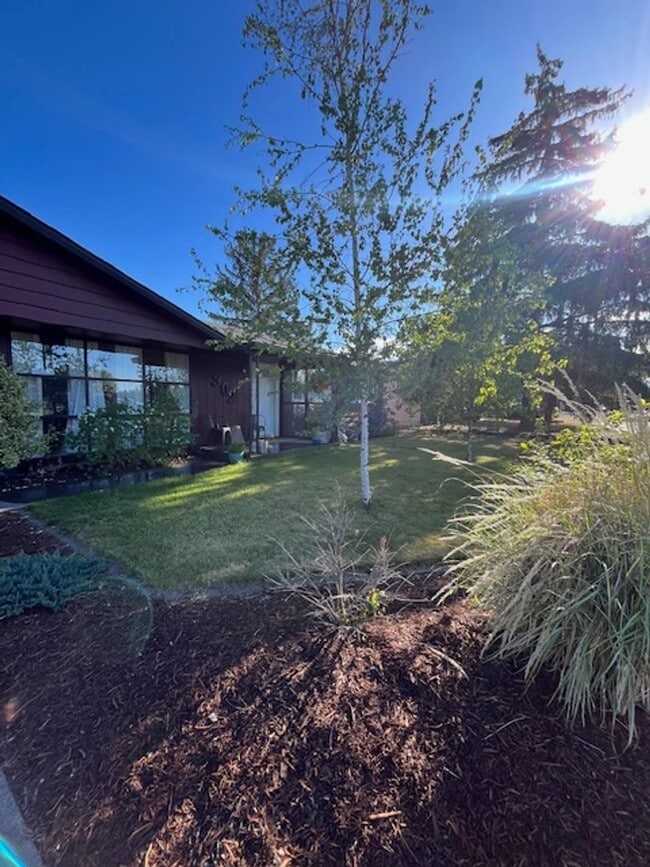 property at 302 NW Dogwood Ave
