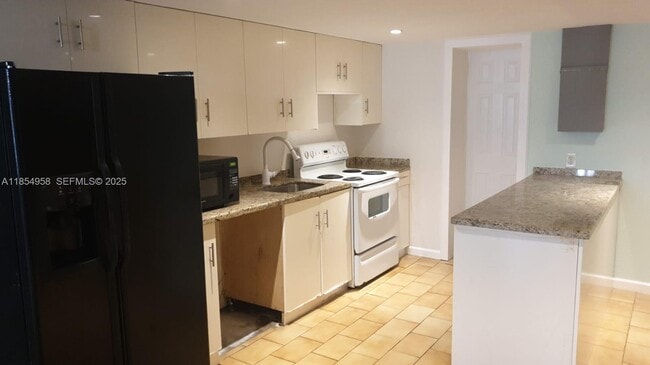 property at 13210 NE 3rd Ave