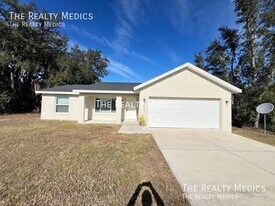 405 Malauka Loop in Ocklawaha, FL - Building Photo