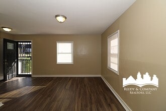 Gorgeous Two-Story White House with Bonus Room in Memphis, TN - Building Photo - Building Photo