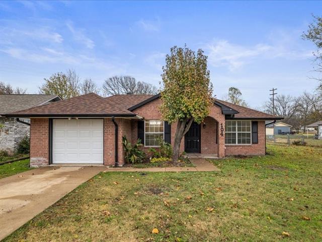 property at 104 S Poplar St