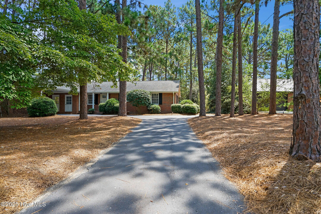 23 Pine Ridge Dr in Whispering Pines, NC - Building Photo