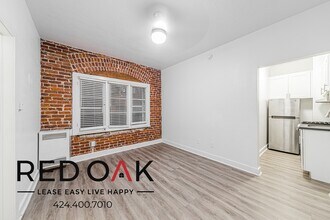 1616 Normandie Ave, Unit 102 in Los Angeles, CA - Foto de edificio - Building Photo