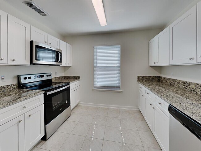 11731 Rolling Stream Dr in Tomball, TX - Building Photo - Building Photo