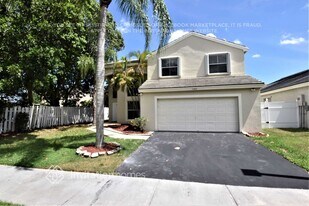 5426 NW 56th Dr in Coconut Creek, FL - Building Photo