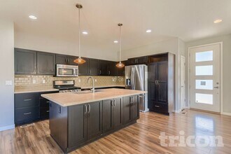 10239 Southlawn Cir in Commerce City, CO - Building Photo - Building Photo