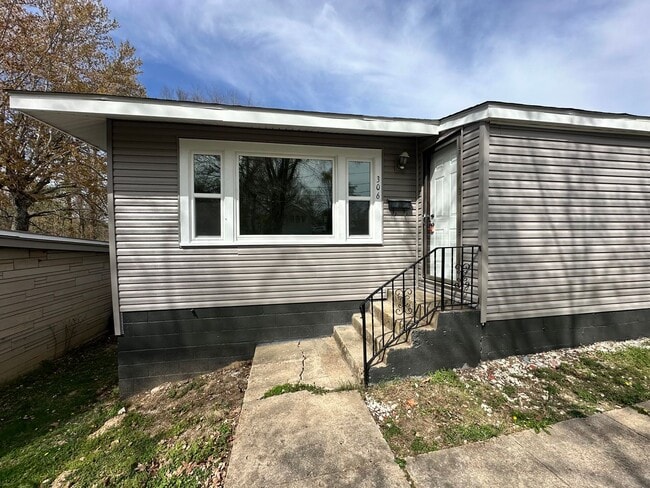 property at 304-306 W 14th St