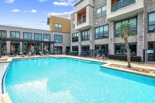 Boardwalk at Mercer Crossing in Farmers Branch, TX - Building Photo