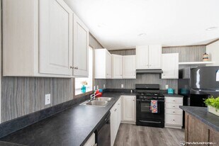 8025 S Huron River Dr in South Rockwood, MI - Building Photo