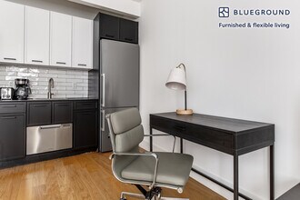 63 Wall St, Unit FL1-ID1336 in New York, NY - Building Photo - Building Photo