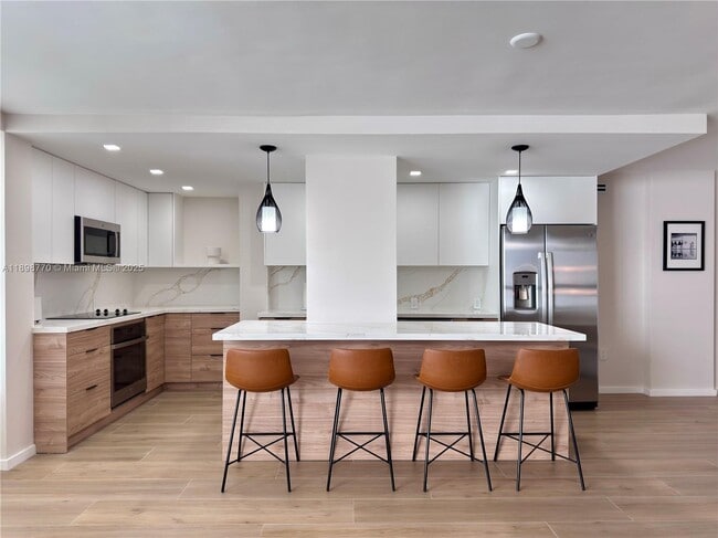 property at 10230 Collins Ave
