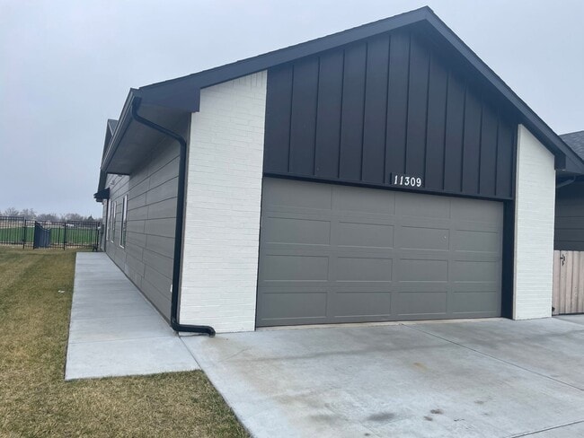 property at 11309-11311 W 35th St S