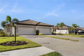 19573 Hinkley Dr in Estero, FL - Building Photo - Building Photo