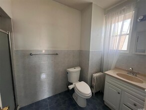 11 Brower Ave-Unit -A in Oceanside, NY - Building Photo - Building Photo