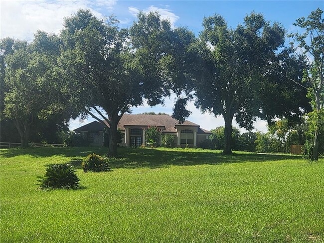 property at 15404 Thoroughbred Ln