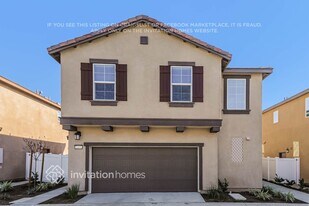 2451 Gunner Ridge Way in Rialto, CA - Building Photo