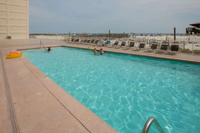 409 E Beach Blvd-Unit -286.1346890 in Gulf Shores, AL - Foto de edificio - Building Photo