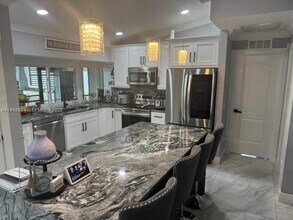 702 NW Orchid St in Port St. Lucie, FL - Building Photo - Building Photo