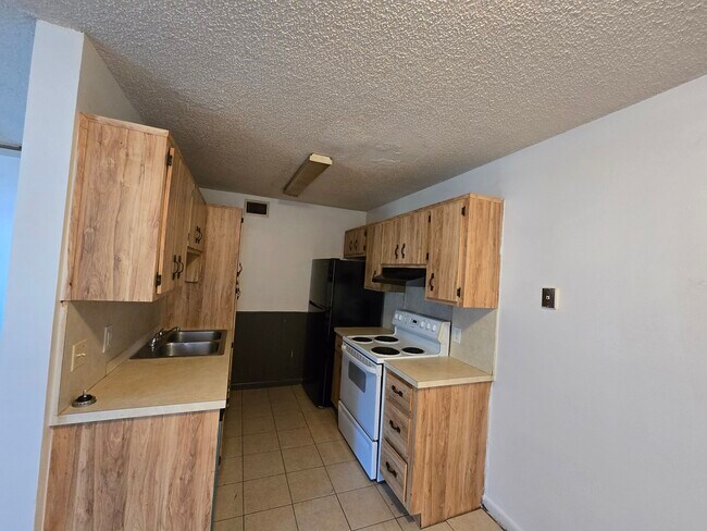 4111 Tree Ridge Ln NE, Unit 4121 in Palm Bay, FL - Foto de edificio - Building Photo
