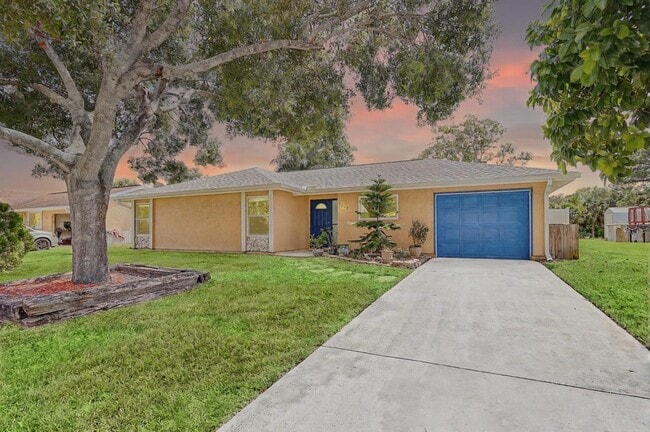 property at 1612 SE Cascella Ct