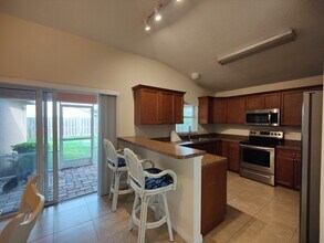 5795 SE Mitzi Ln in Stuart, FL - Building Photo - Building Photo
