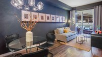 Living Room with Hardwood Floors - Radius Koreatown Apartments in Los Angeles, California