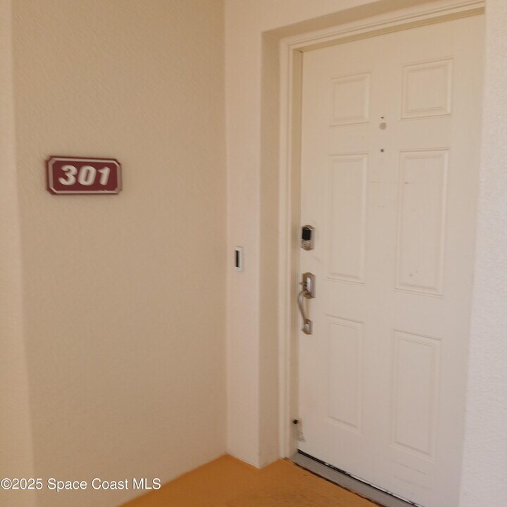 7128 Marbella Ct in Cape Canaveral, FL - Building Photo