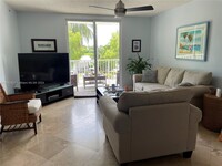 1555 N Treasure Dr, Unit # 210 in North Bay Village, FL - Building Photo - Building Photo