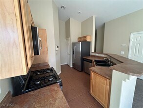 8668 Tom Noon Ave in Las Vegas, NV - Building Photo - Building Photo