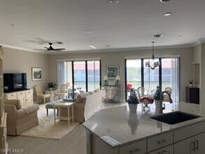 15148 Palmer Lake Cir-Unit -201 in Naples, FL - Building Photo - Building Photo