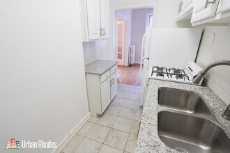 544 W Surf St, Unit M602 in Chicago, IL - Building Photo - Building Photo
